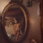 Katyuska Doleatto, <em>Self Portrait with Polaroid Camera,</em> 2013