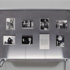 Eric Baudelaire, <em>The Makes (The Story of a Love Affair That Never Existed)</em>, Found Japanese film stills, page torn from That Bowling Alley on the Tiber by Michelangelo Antonioni, Plexiglas, steel and fluorescent tubing, 2009