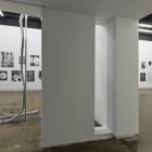 Eileen Quinlan, <em>Enough</em>, silver gelatin prints. Laurie Kang, <em>A Body Knots</em>, steel studs, flex-track, hardware. Installation view at Gallery TPW. Documentation: Toni Hafkenscheid.
